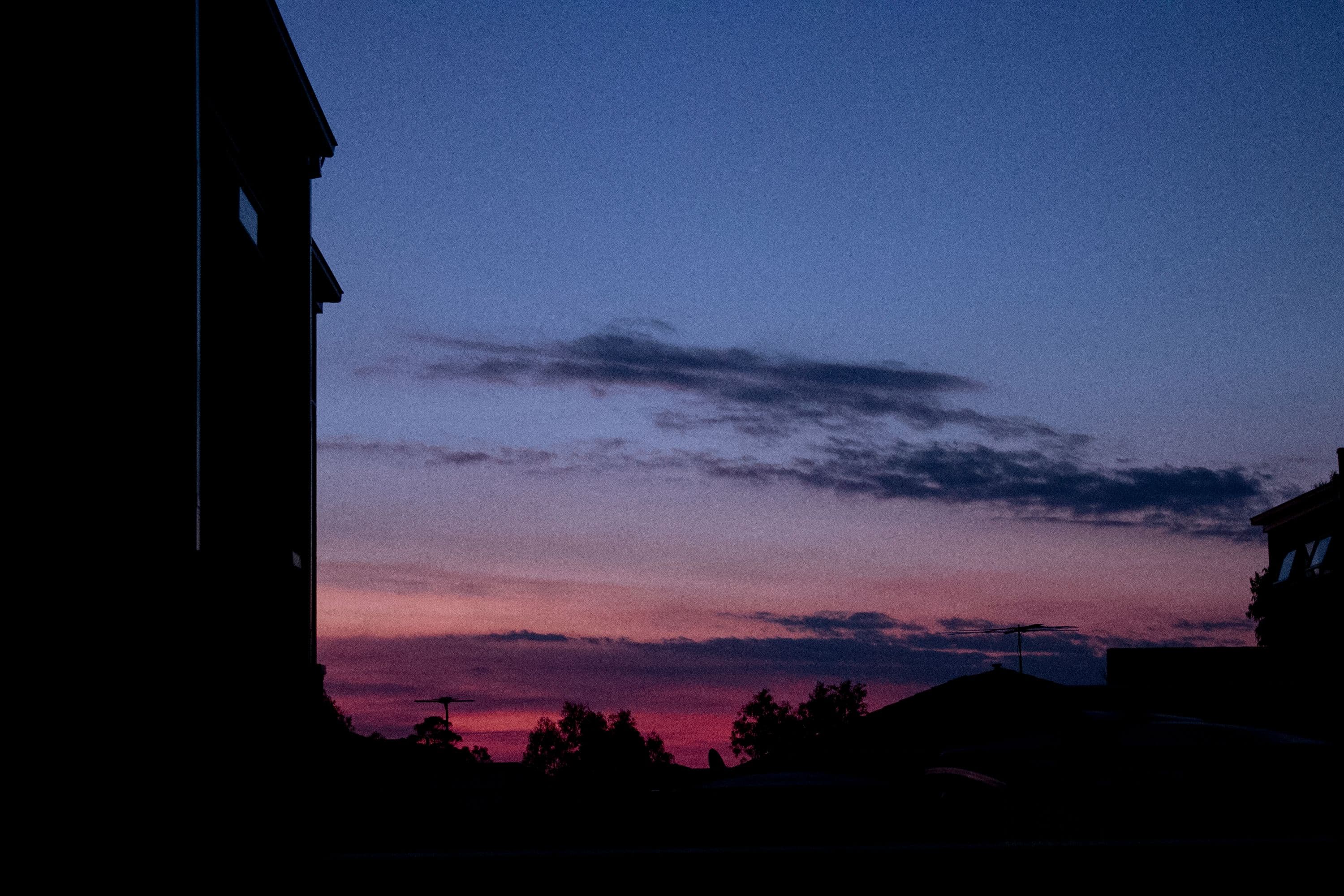 Sunset with blue sky, colours and light shadow